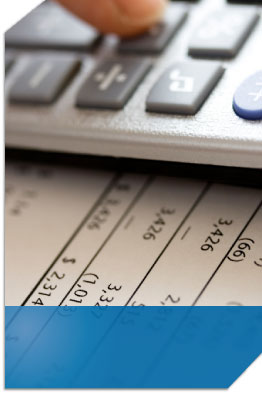 Couple standing in a field looking at an outline of where their house could be with the right mortgage.
